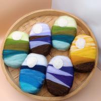 Tanda de jabones envueltos en lana de paisajes